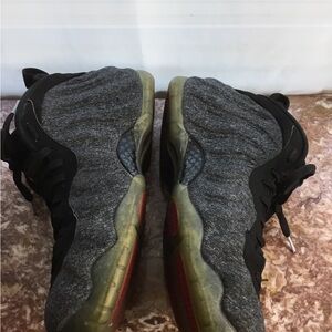 Gray and Black Sneakers with Red Soles